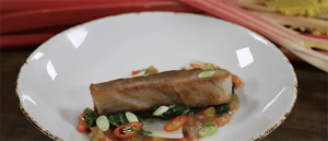 Crispy Pork Belly With Rhubarb Sweet And Sour Sauce dish served