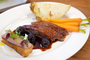 Spiced roast duck served