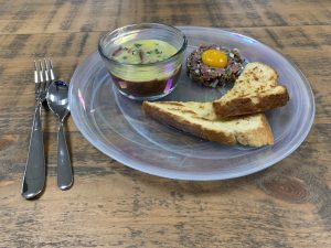 Potted Salt Beef, Tartare, Confit Yolk & Sour Dough dish