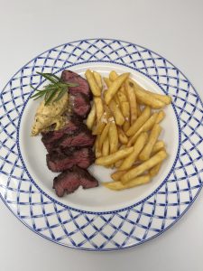 Bavette with butter dish served